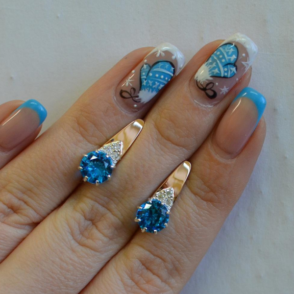 Срібні сережки з золотими вставками