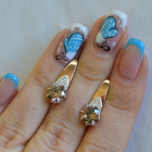 Срібні сережки з золотими вставками