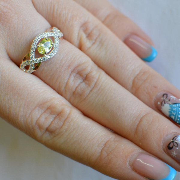 Срібна каблучка з золотими накладками