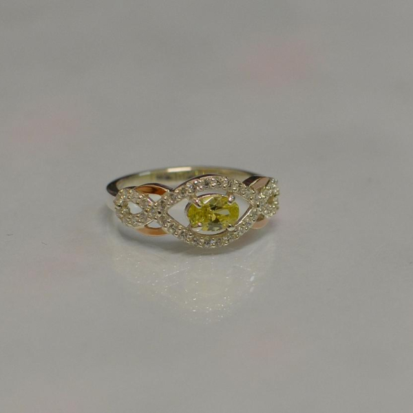 Срібна каблучка з золотими накладками