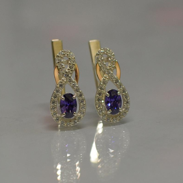 Срібні сережки з золотими вставками