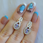 Срібні сережки з золотими вставками