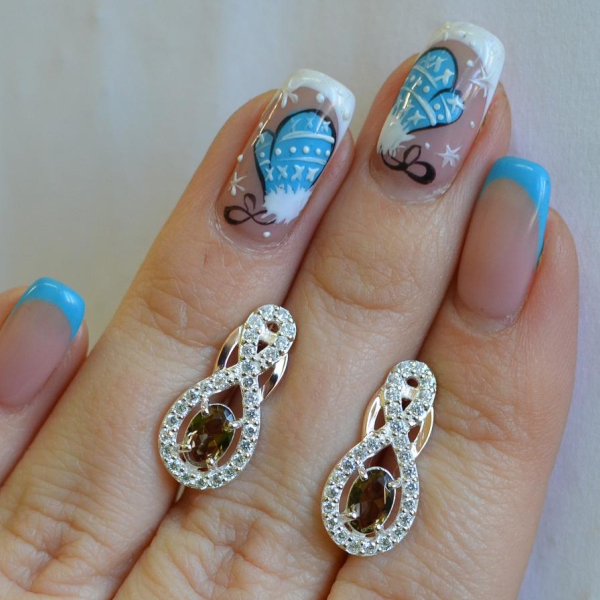 Срібні сережки з золотими вставками