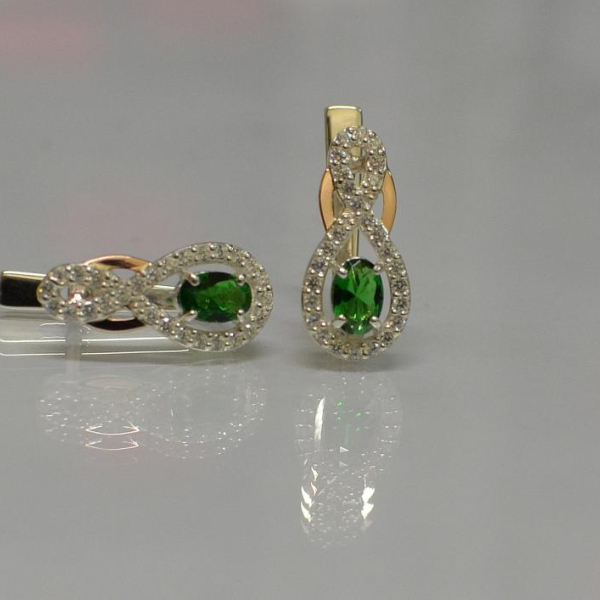 Срібні сережки з золотими вставками