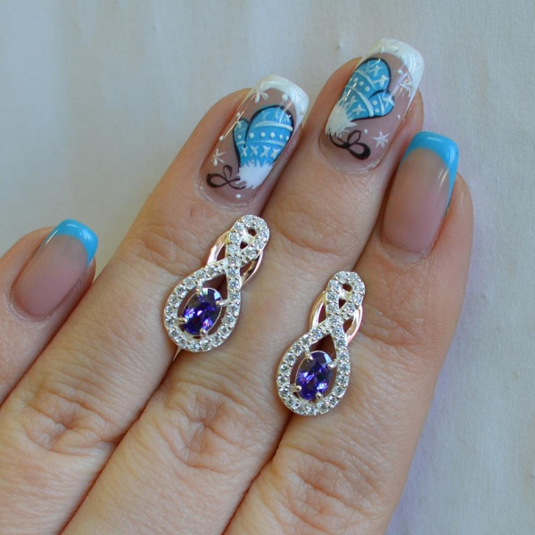 Срібні сережки з золотими вставками