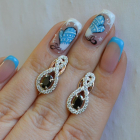 Срібні сережки з золотими вставками