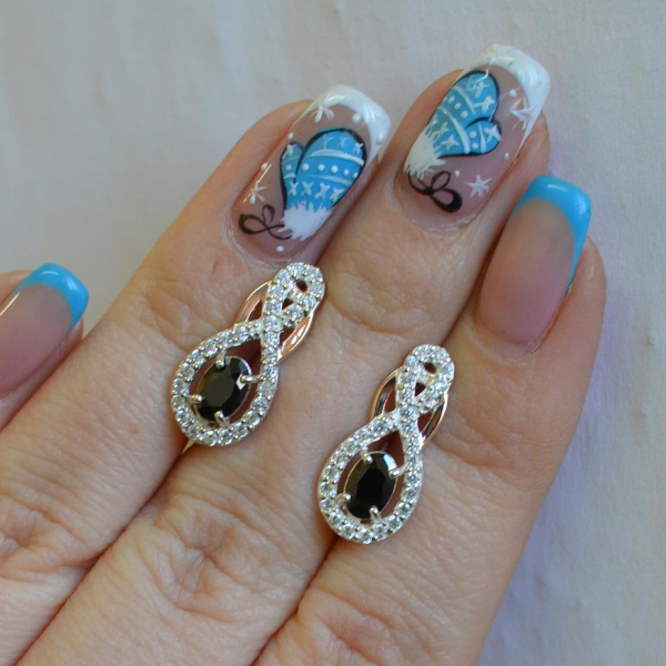 Срібні сережки з золотими вставками