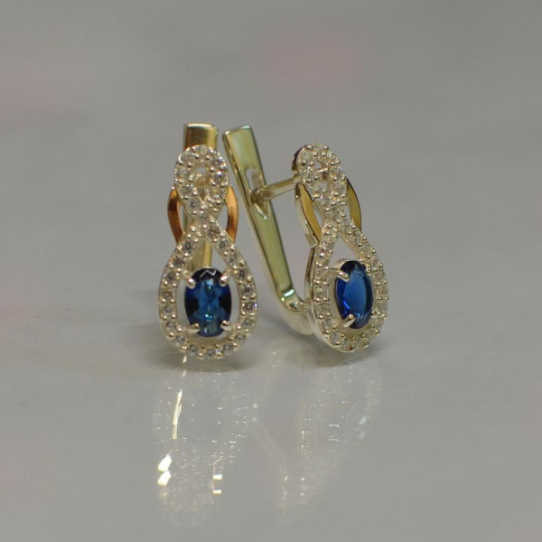 Срібні сережки з золотими вставками