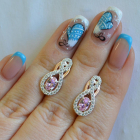 Срібні сережки з золотими вставками