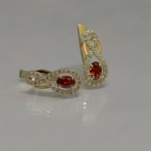 Срібні сережки з золотими вставками