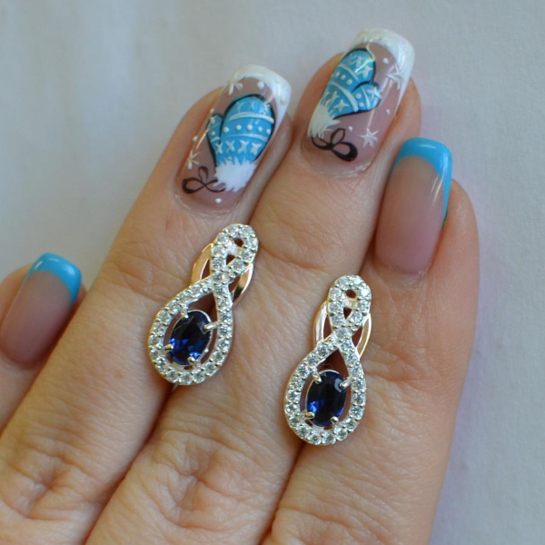 Срібні сережки з золотими вставками