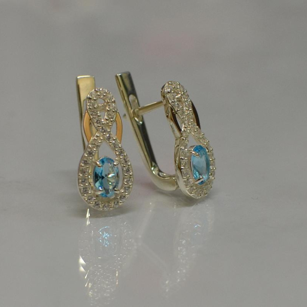 Срібні сережки з золотими вставками