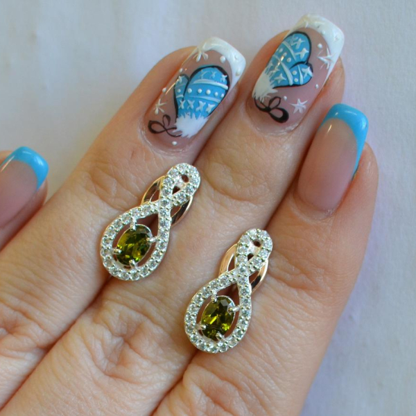 Срібні сережки з золотими вставками