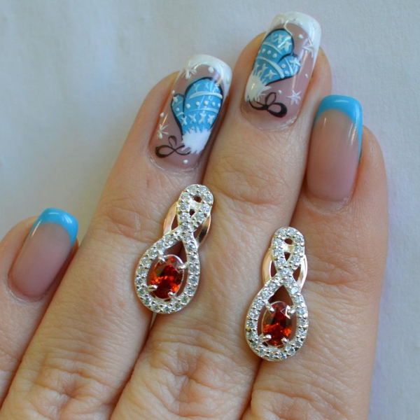 Срібні сережки з золотими вставками