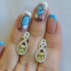 Срібні сережки з золотими вставками