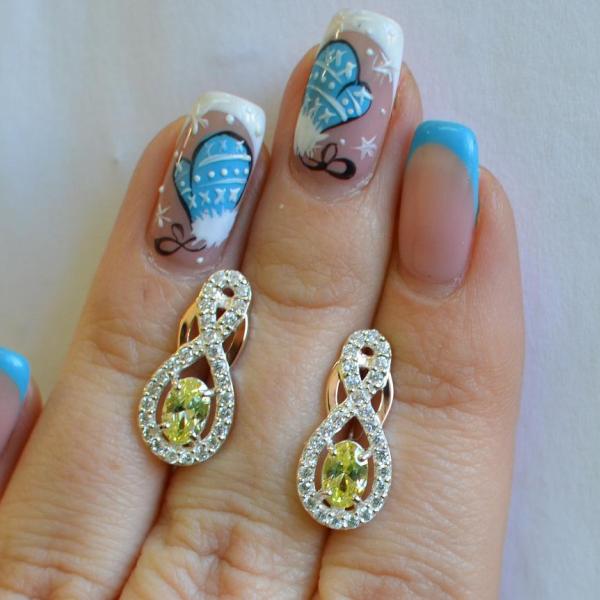 Срібні сережки з золотими вставками