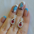 Срібні сережки з золотими вставками