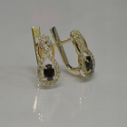 Срібні сережки з золотими вставками