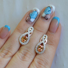 Срібні сережки з золотими вставками