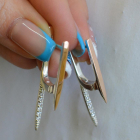 Срібні сережки з золотими вставками