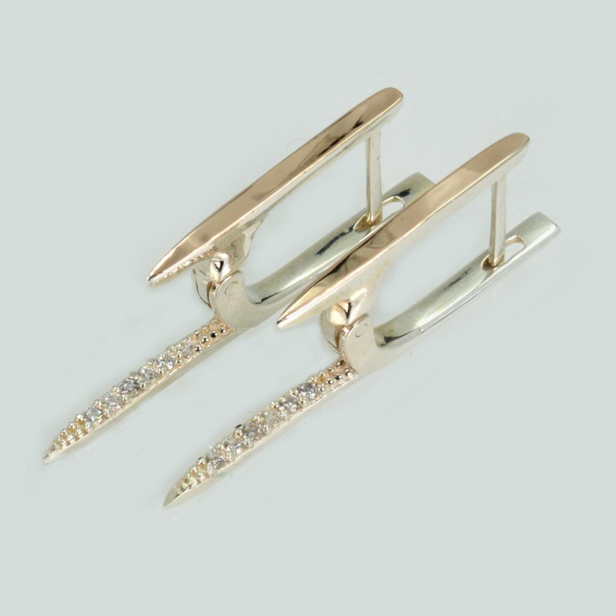 Срібні сережки з золотими вставками