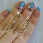 Срібні сережки з золотими вставками