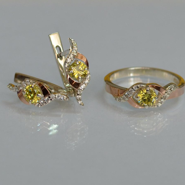 Срібний гарнітур з золотими пластинами