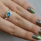 Серебряное кольцо с золотыми вставками