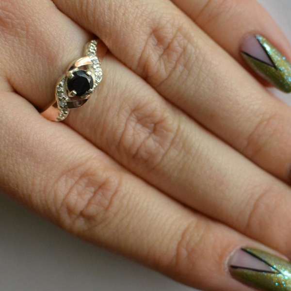 Серебряное кольцо с золотыми вставками