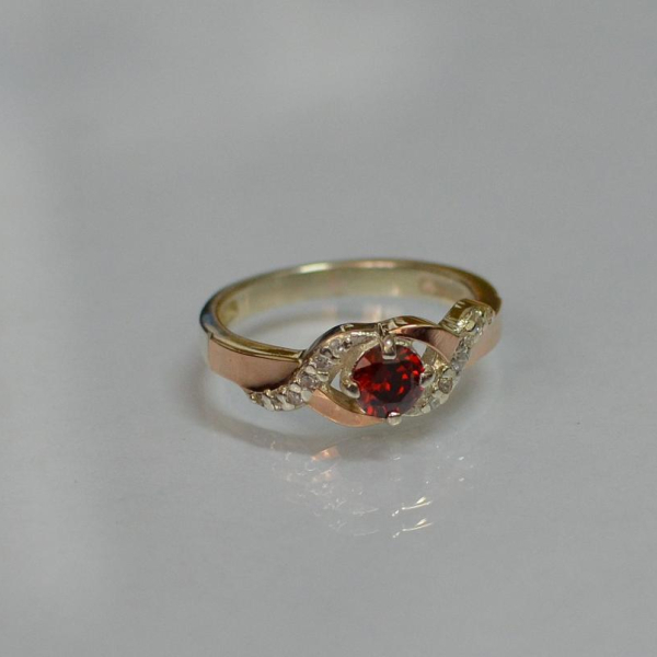 Серебряное кольцо с золотыми вставками