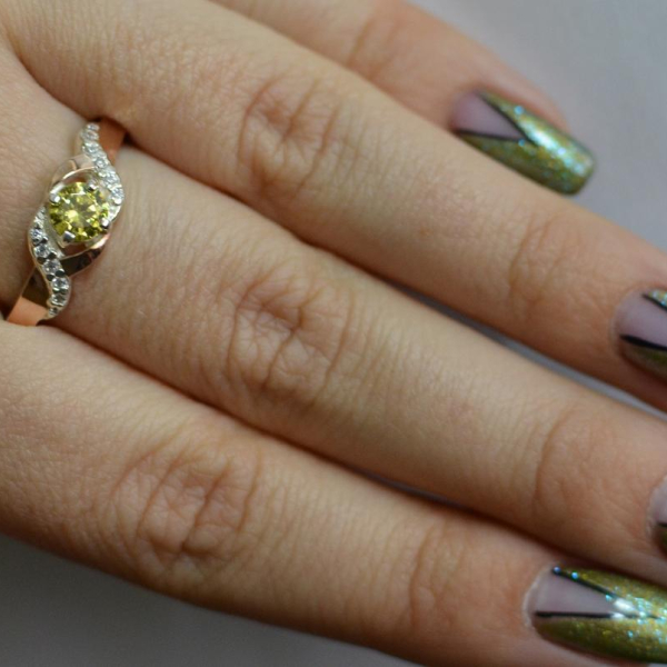 Серебряное кольцо с золотыми вставками