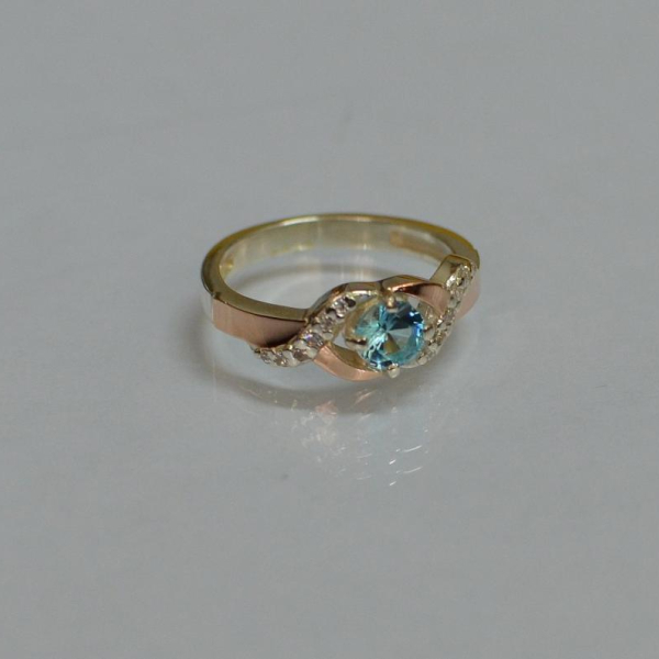 Серебряное кольцо с золотыми вставками