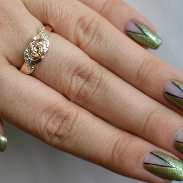 Серебряное кольцо с золотыми вставками