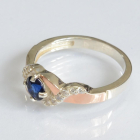 Серебряное кольцо с золотыми вставками