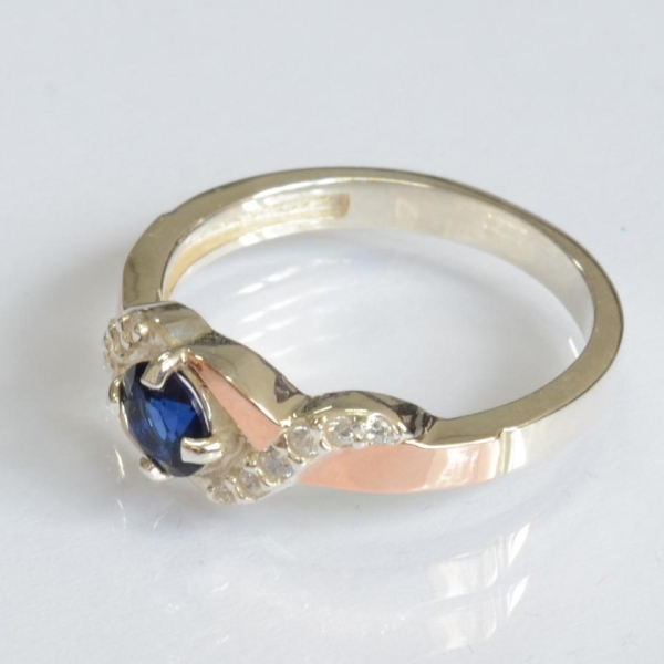 Серебряное кольцо с золотыми вставками