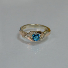 Серебряное кольцо с золотыми вставками