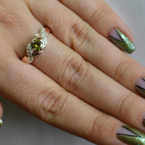 Серебряное кольцо с золотыми вставками