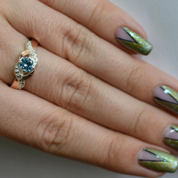 Серебряное кольцо с золотыми вставками