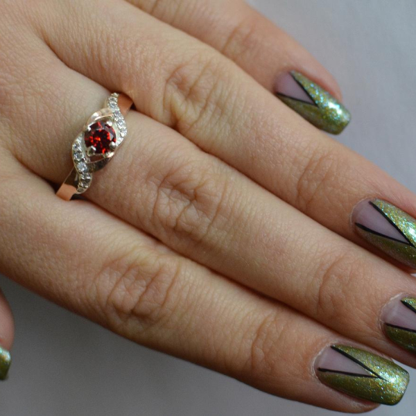 Серебряное кольцо с золотыми вставками