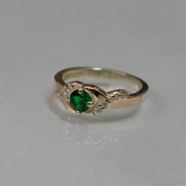 Серебряное кольцо с золотыми вставками