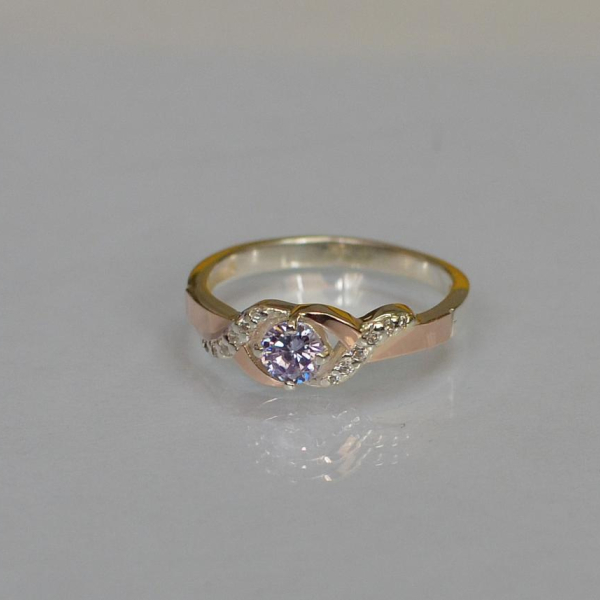 Серебряное кольцо с золотыми вставками