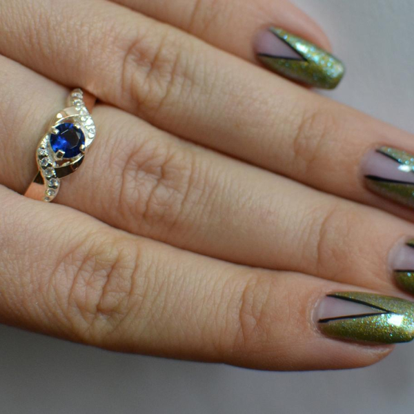 Серебряное кольцо с золотыми вставками