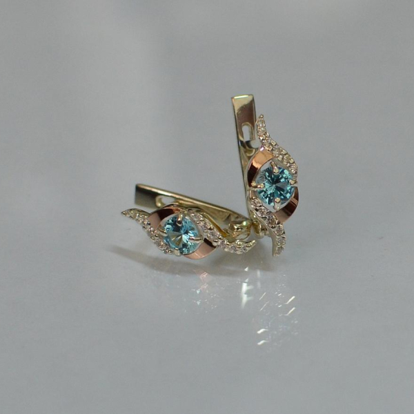 Срібні сережки з золотими накладками