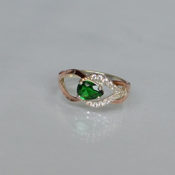 Срібна каблучка з золотими вставками