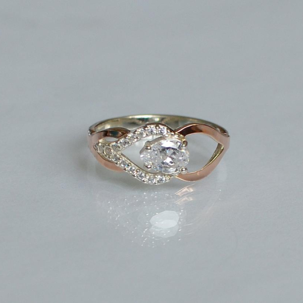 Срібна каблучка з золотими вставками