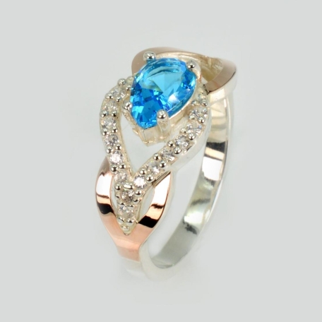 Срібна каблучка з золотими вставками