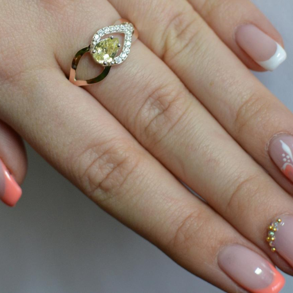 Срібна каблучка з золотими вставками