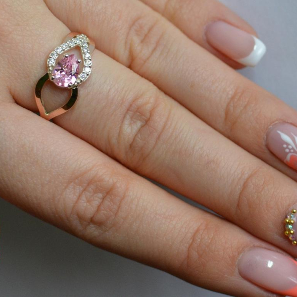 Срібна каблучка з золотими вставками