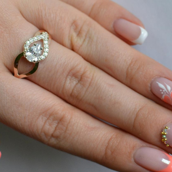 Срібна каблучка з золотими вставками