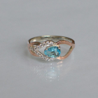 Срібна каблучка з золотими вставками